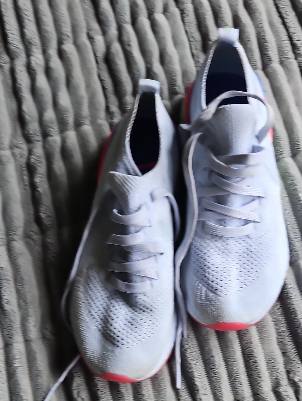 Nike Men's White Knit Sneakers with Coral Highlights